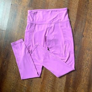 Pink Athleta Salutation Stash Pocket Tights